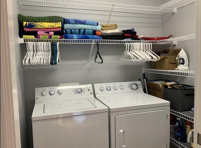 laundry area featuring laundry area and washer and dryer
