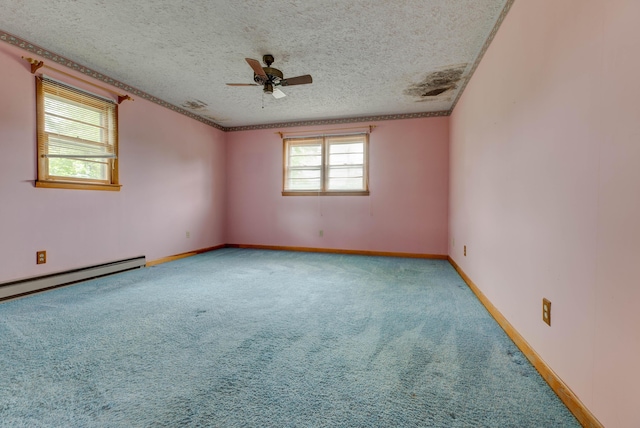 unfurnished room with a ceiling fan, light carpet, a baseboard heating unit, and a textured ceiling