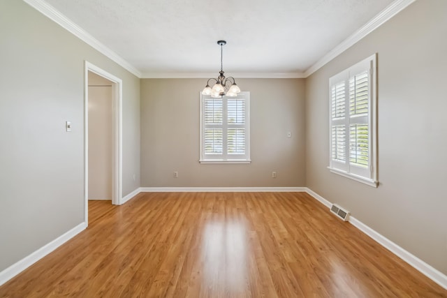 1141 Danville Rd, Lancaster, KY 40444 - unfurnished room featuring an inviting chandelier, plenty of natural light, visible vents, and light wood-type flooring