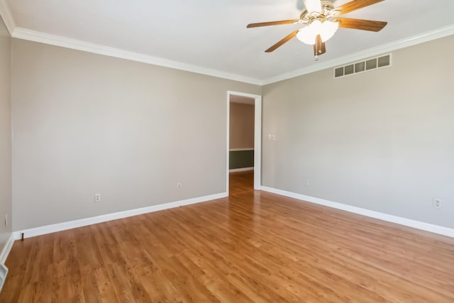 1141 Danville Rd, Lancaster, KY 40444 - unfurnished room featuring crown molding, light wood-style flooring, baseboards, and visible vents
