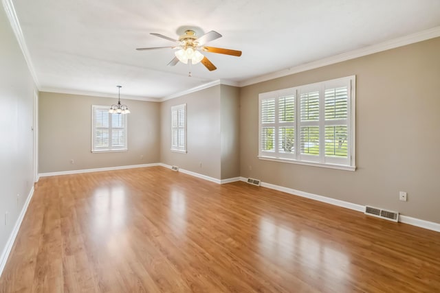 1141 Danville Rd, Lancaster, KY 40444 - spare room with light wood-style floors, visible vents, ceiling fan with notable chandelier, and ornamental molding