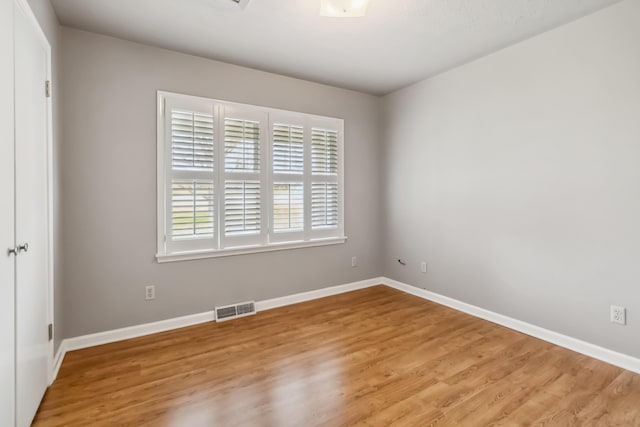 1141 Danville Rd, Lancaster, KY 40444 - unfurnished room with light wood-style floors, visible vents, and baseboards