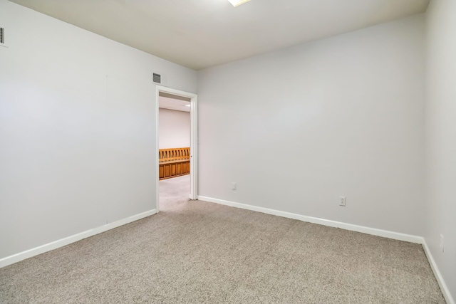 1141 Danville Rd, Lancaster, KY 40444 - spare room with carpet flooring, visible vents, and baseboards