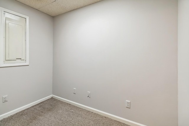 1141 Danville Rd, Lancaster, KY 40444 - unfurnished room featuring baseboards, carpet flooring, and a paneled ceiling