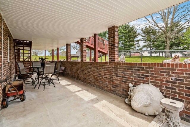 1141 Danville Rd, Lancaster, KY 40444 - view of patio / terrace with stairway, fence, and outdoor dining space