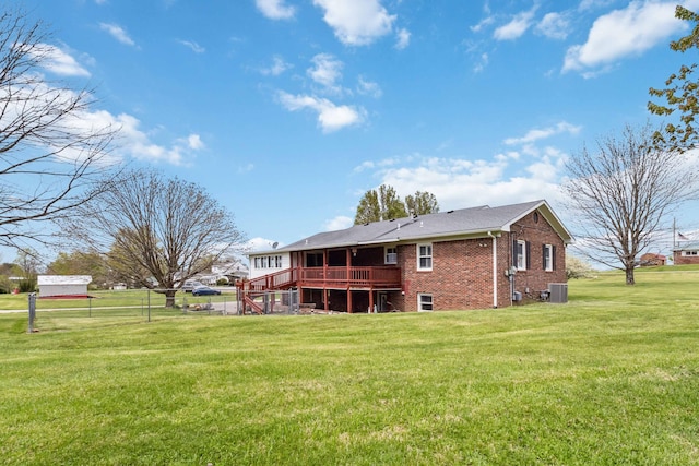 1141 Danville Rd, Lancaster, KY 40444 - back of house with a yard, fence, a wooden deck, central air condition unit, and brick siding