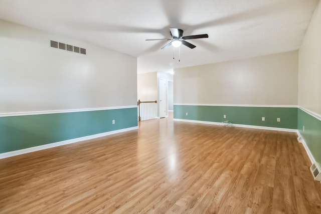 1141 Danville Rd, Lancaster, KY 40444 - spare room with baseboards, a ceiling fan, visible vents, and wood finished floors