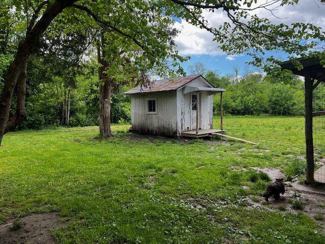 130 Trisler Ln, Junction City, KY 40440 - view of yard with a shed and an outbuilding