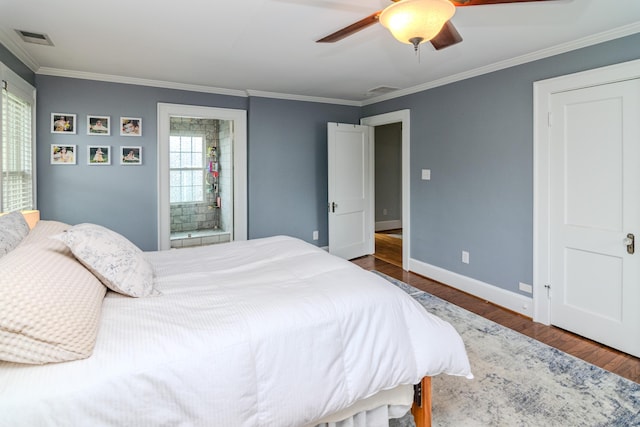bedroom featuring wood finished floors, ornamental molding, baseboards, and a ceiling fan