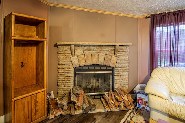787 Wise Owl Rd, Keavy, KY 40737 - living room with crown molding, a textured ceiling, wood finished floors, and a fireplace