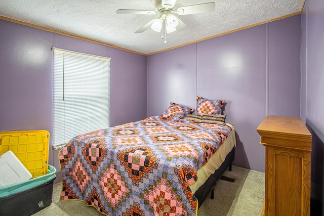787 Wise Owl Rd, Keavy, KY 40737 - bedroom with crown molding, a textured ceiling, a ceiling fan, and carpet floors