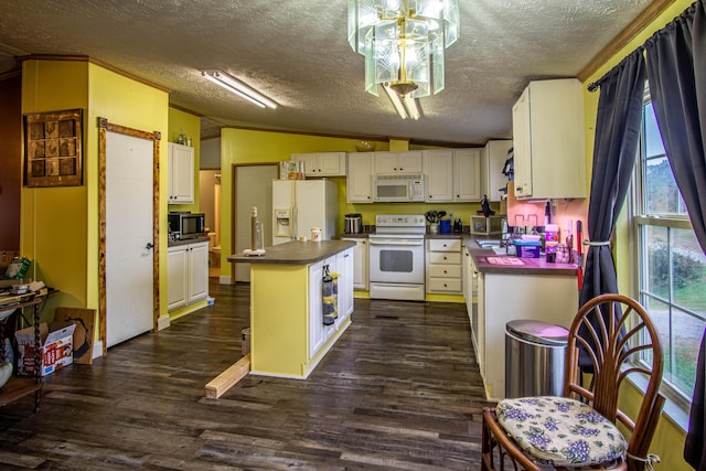 787 Wise Owl Rd, Keavy, KY 40737 - kitchen featuring lofted ceiling, a textured ceiling, white appliances, and dark countertops
