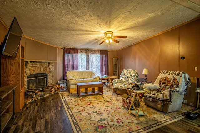787 Wise Owl Rd, Keavy, KY 40737 - living area with a textured ceiling, ornamental molding, ceiling fan, wood finished floors, and a fireplace
