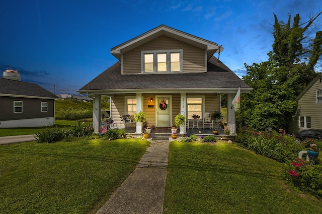 523 W High St, Mt Sterling, KY 40353 - bungalow-style house featuring a porch, a front lawn, and roof with shingles