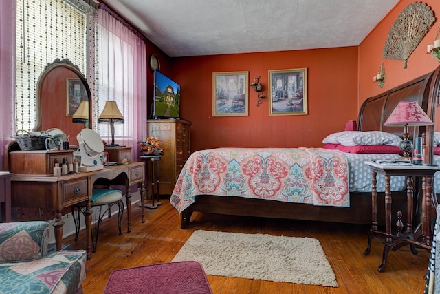 523 W High St, Mt Sterling, KY 40353 - bedroom featuring hardwood / wood-style flooring and a textured ceiling