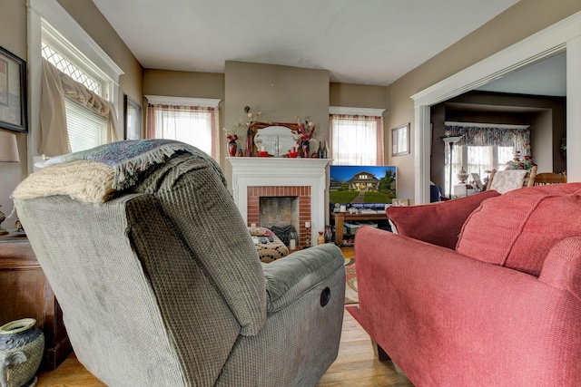 523 W High St, Mt Sterling, KY 40353 - living area with wood finished floors and a fireplace