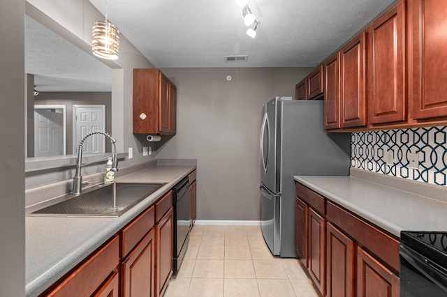 kitchen featuring a sink, black appliances, tasteful backsplash, baseboards, and light tile patterned floors