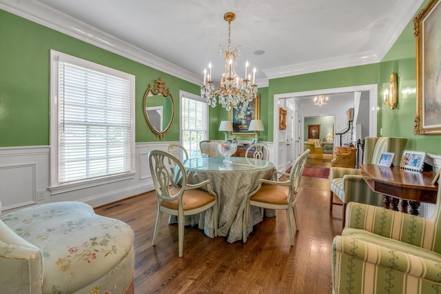 1775 Mooreland Dr, Lexington, KY 40502 - dining space featuring a chandelier, wainscoting, wood finished floors, ornamental molding, and a decorative wall