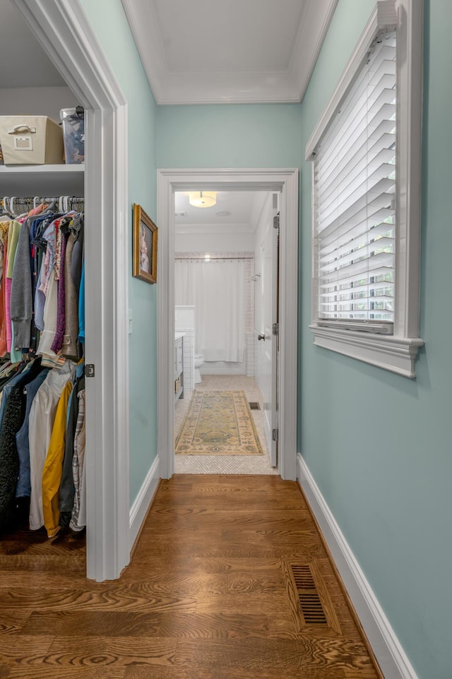 1775 Mooreland Dr, Lexington, KY 40502 - hall featuring crown molding, wood finished floors, and baseboards