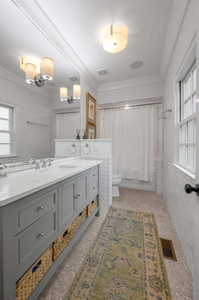 1775 Mooreland Dr, Lexington, KY 40502 - full bathroom featuring toilet, ornamental molding, shower / bathtub combination with curtain, vanity, and a wainscoted wall
