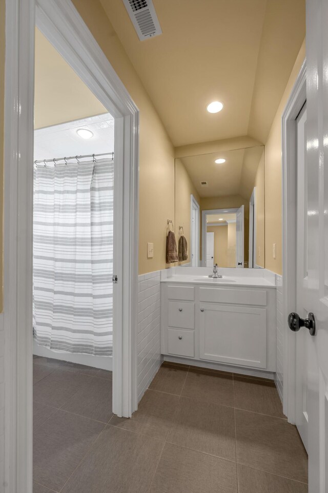 1775 Mooreland Dr, Lexington, KY 40502 - bathroom featuring wainscoting, vanity, tile patterned floors, and recessed lighting