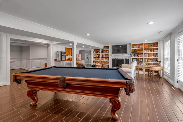 1775 Mooreland Dr, Lexington, KY 40502 - rec room with pool table, a fireplace, wood finished floors, a wainscoted wall, and ornamental molding
