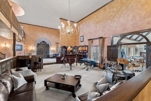 129 Adams Ln, Richmond, KY 40475 - living room with an inviting chandelier, a towering ceiling, carpet, and arched walkways