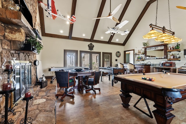 129 Adams Ln, Richmond, KY 40475 - playroom featuring french doors, pool table, high vaulted ceiling, beamed ceiling, and concrete flooring
