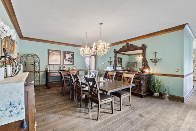 129 Adams Ln, Richmond, KY 40475 - dining room featuring baseboards, an inviting chandelier, crown molding, and wood finished floors