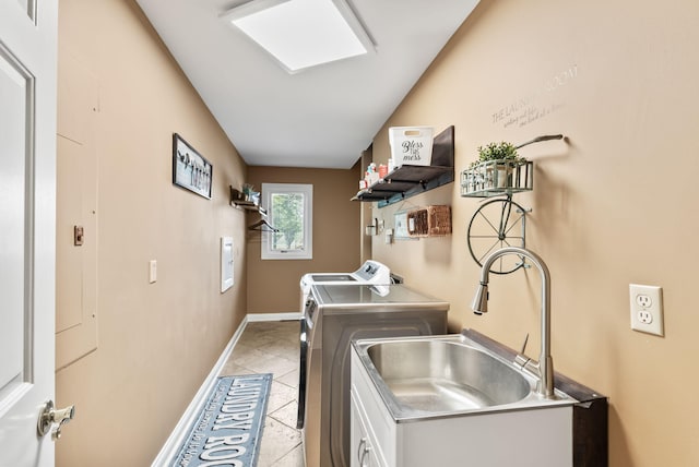 129 Adams Ln, Richmond, KY 40475 - laundry area with independent washer and dryer, baseboards, light tile patterned floors, a sink, and laundry area