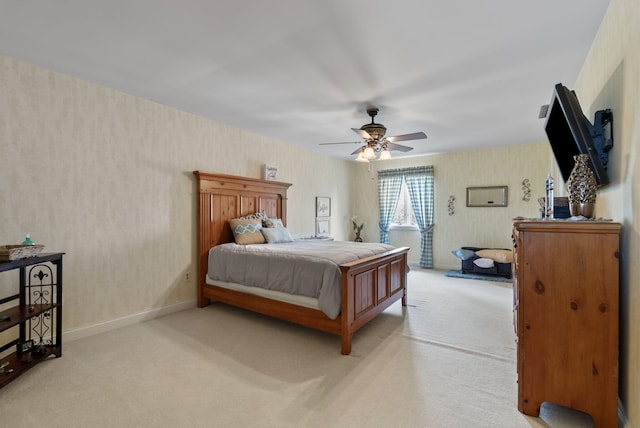 129 Adams Ln, Richmond, KY 40475 - bedroom with light colored carpet, wallpapered walls, baseboards, and a ceiling fan