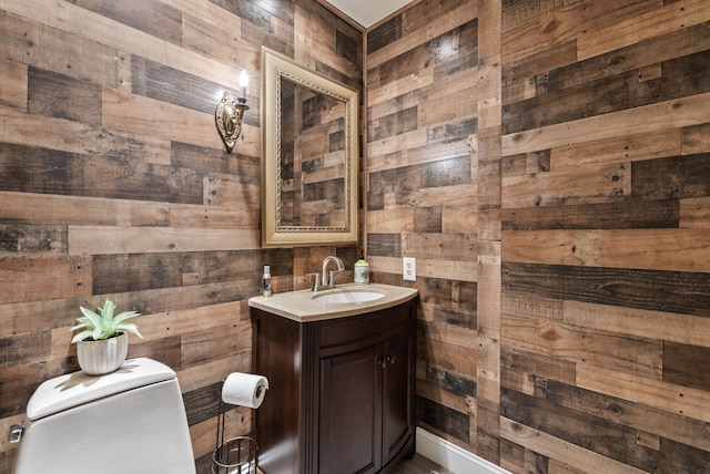 129 Adams Ln, Richmond, KY 40475 - half bathroom with toilet, wood walls, and vanity