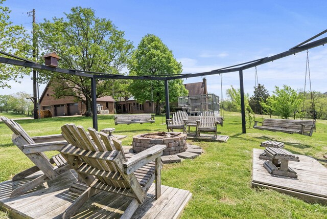 129 Adams Ln, Richmond, KY 40475 - view of yard featuring an outdoor fire pit and a wooden deck
