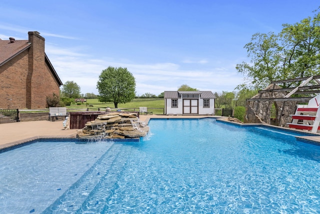 129 Adams Ln, Richmond, KY 40475 - pool with fence, a patio, and an outbuilding