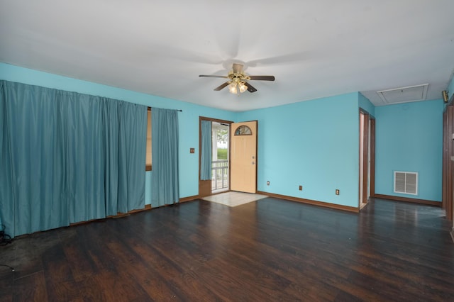 17590 New Columbus Rd, Corinth, KY 41010 - unfurnished room featuring wood finished floors, attic access, visible vents, ceiling fan, and baseboards