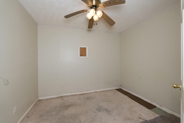 17590 New Columbus Rd, Corinth, KY 41010 - carpeted spare room with a textured ceiling, baseboards, and a ceiling fan