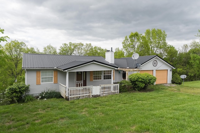 17590 New Columbus Rd, Corinth, KY 41010 - back of house featuring an attached garage, a porch, metal roof, and a yard