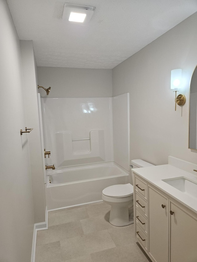 bathroom featuring shower / washtub combination, toilet, vanity, and tile patterned floors