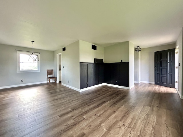 500 Meadowlark Dr, Somerset, KY 42503 - unfurnished living room featuring baseboards, visible vents, and dark wood finished floors