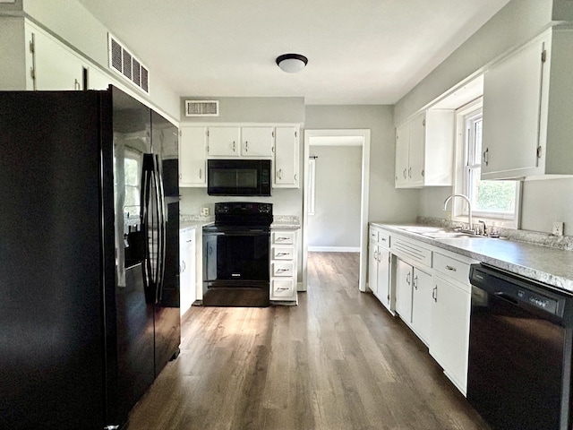 500 Meadowlark Dr, Somerset, KY 42503 - kitchen with black appliances, visible vents, a sink, and dark wood-type flooring