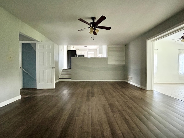 500 Meadowlark Dr, Somerset, KY 42503 - unfurnished living room with visible vents, baseboards, a ceiling fan, and dark wood-style floors