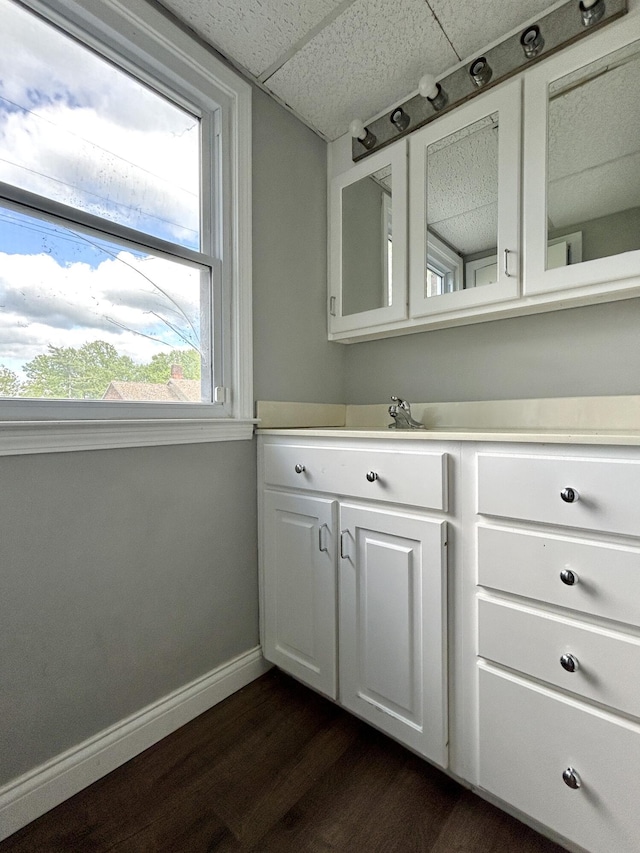 500 Meadowlark Dr, Somerset, KY 42503 - bathroom featuring a paneled ceiling, baseboards, vanity, and wood finished floors
