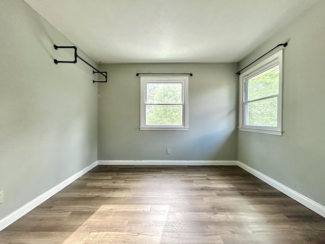 500 Meadowlark Dr, Somerset, KY 42503 - spare room with baseboards and dark wood-style flooring