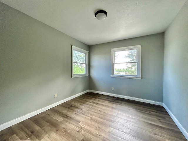 500 Meadowlark Dr, Somerset, KY 42503 - empty room featuring dark wood-style flooring and baseboards