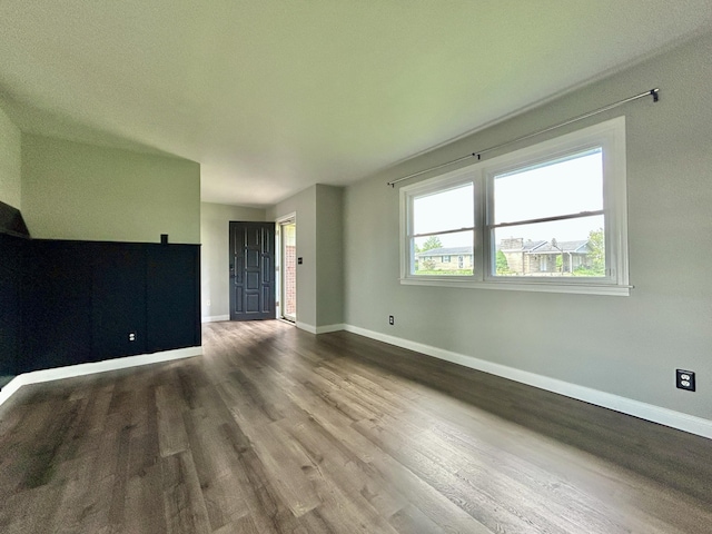 500 Meadowlark Dr, Somerset, KY 42503 - unfurnished living room with baseboards and wood finished floors