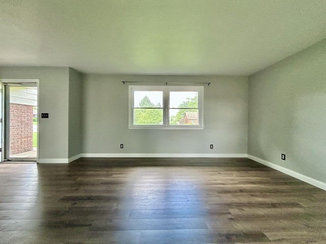 500 Meadowlark Dr, Somerset, KY 42503 - empty room with baseboards and dark wood-style floors