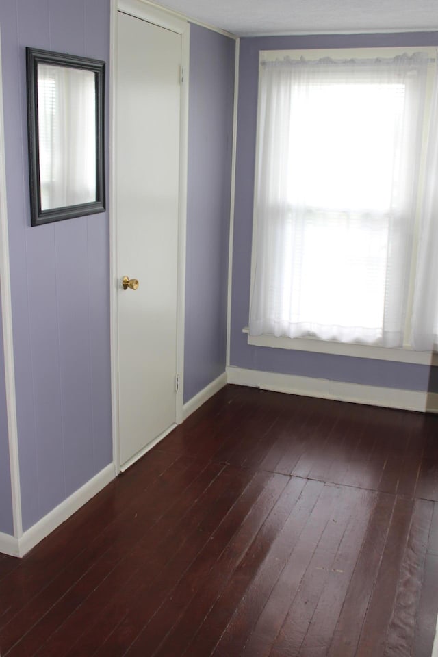 121 Smith Ballard St, Richmond, KY 40475 - spare room featuring baseboards and dark wood finished floors