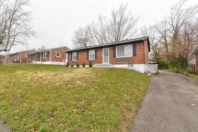 1732 Costigan Dr, Lexington, KY 40511 - ranch-style home with a front yard and brick siding