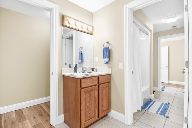 1117 Cliffs Edge Rd, East Bernstadt, KY 40729 - bathroom featuring vanity, baseboards, and tile patterned floors