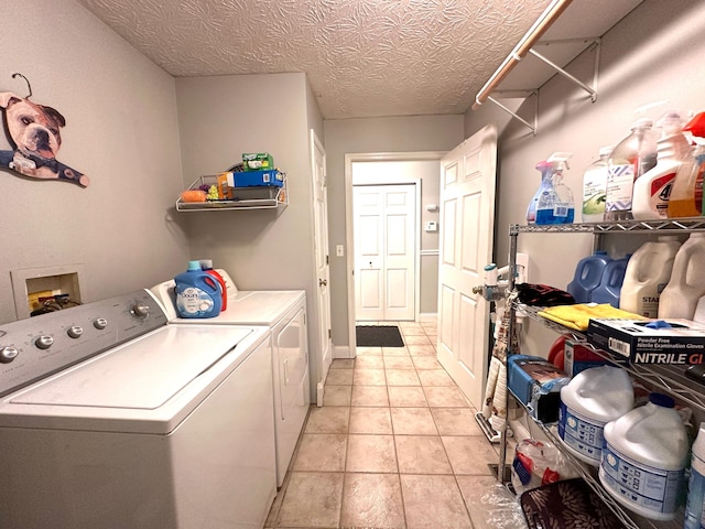 315 Sukey Hollow Rd, Williamsburg, KY 40769 - laundry room featuring washing machine and dryer and light tile patterned flooring